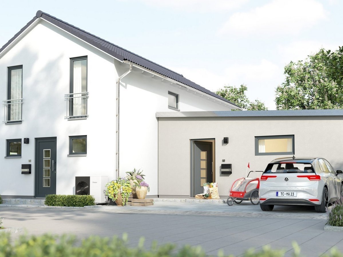 Modernes Einfamilienhaus mit heller Fassade, Garage und Stellplatz